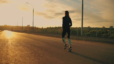 young-woman-is-running-alone-in-morning-or-evening-in-summer-training-alone-outdoors-jog